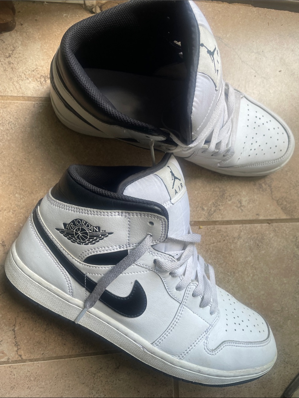Jordan White and Black High-Top Sneakers